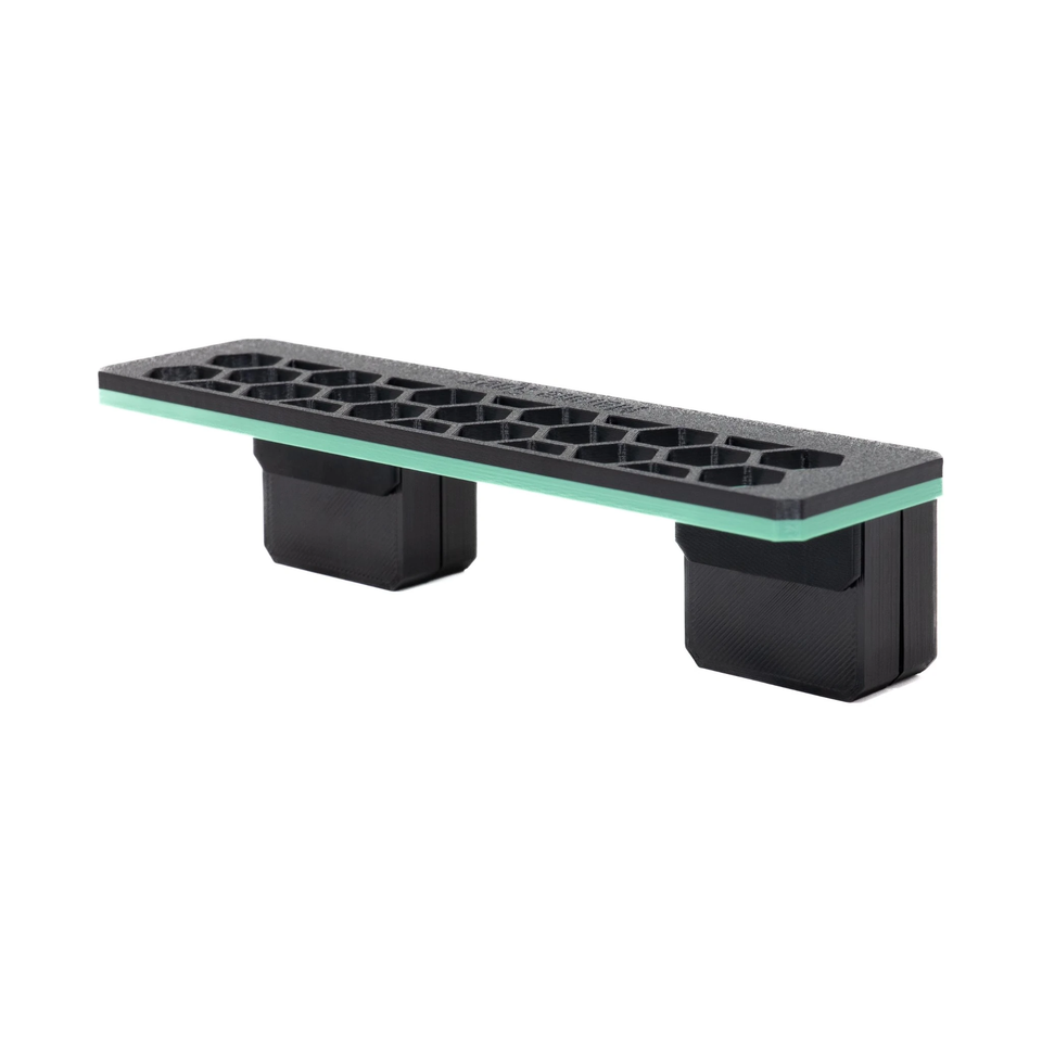 Slim magnetic frag rack in Aqua Green with its magnet blocks underneath