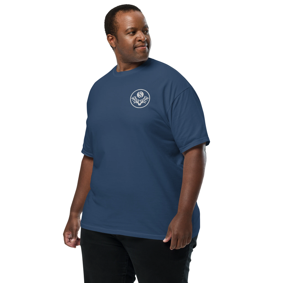 Man wearing the French Navy Reef State, Meditate t-shirt, front view