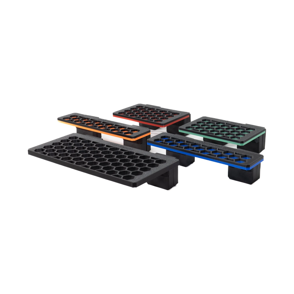 Magnetic frag racks in several sizes and colours laid out together