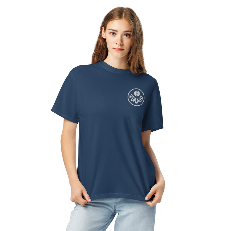Woman wearing the French Navy Reef State, Meditate t-shirt, front view
