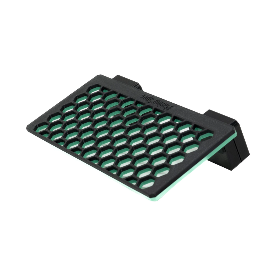 Standard magnetic frag rack in Aqua Green with its magnet block at the side
