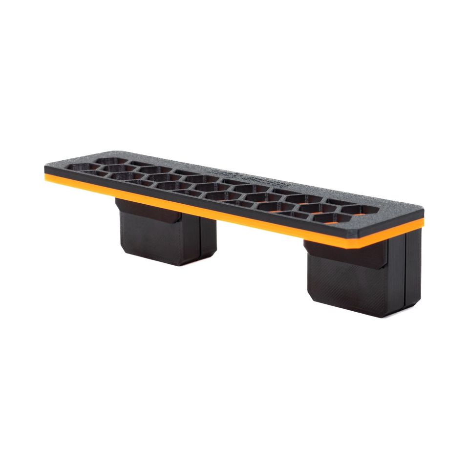 Slim magnetic frag rack in Clown Orange with its magnet blocks underneath