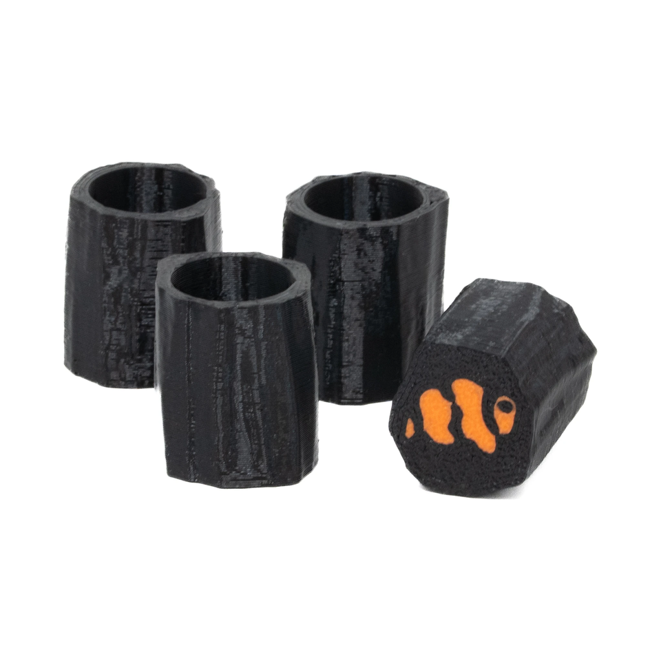 FragDoc frag plug docks in black, with the Marine Spec clownfish logo on one