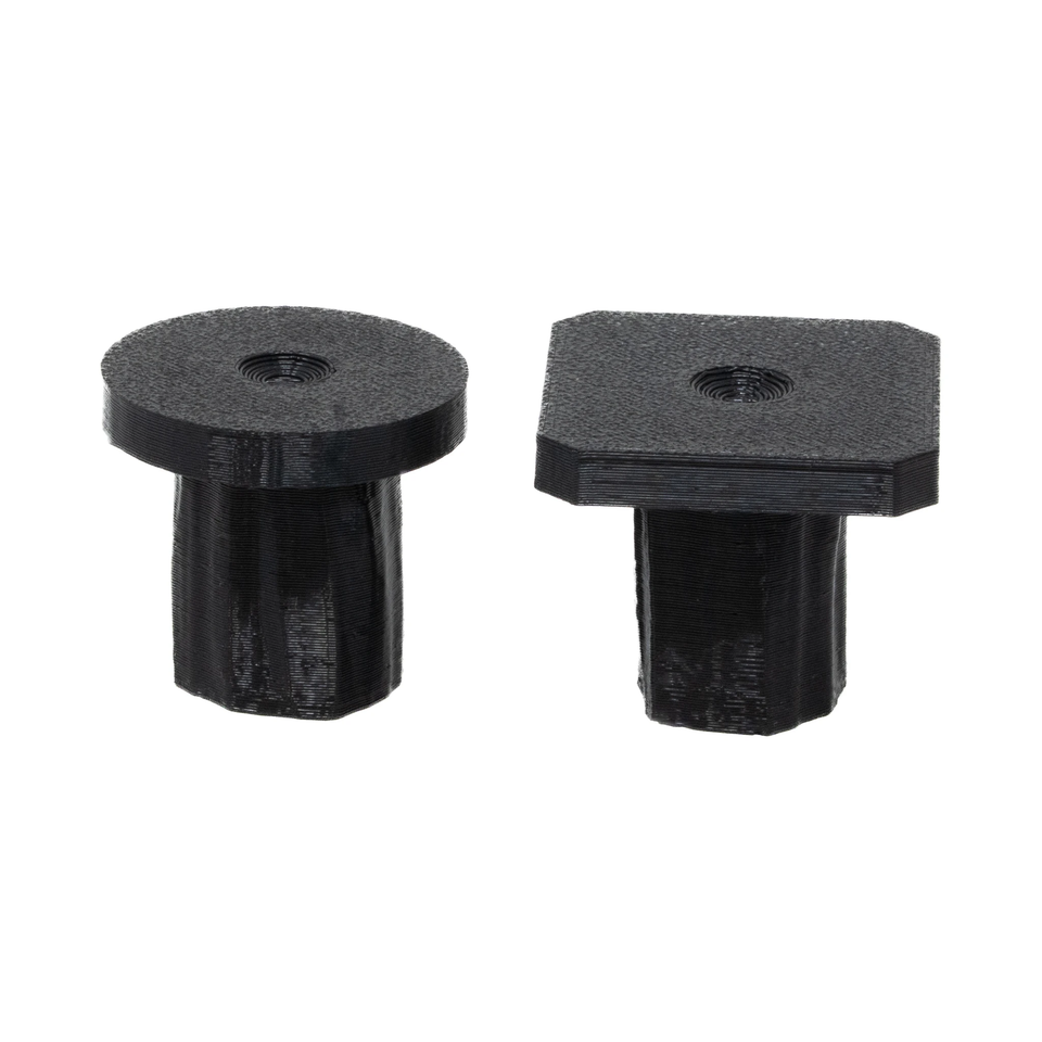 Round and square black frag plugs seated in FragDoc docks