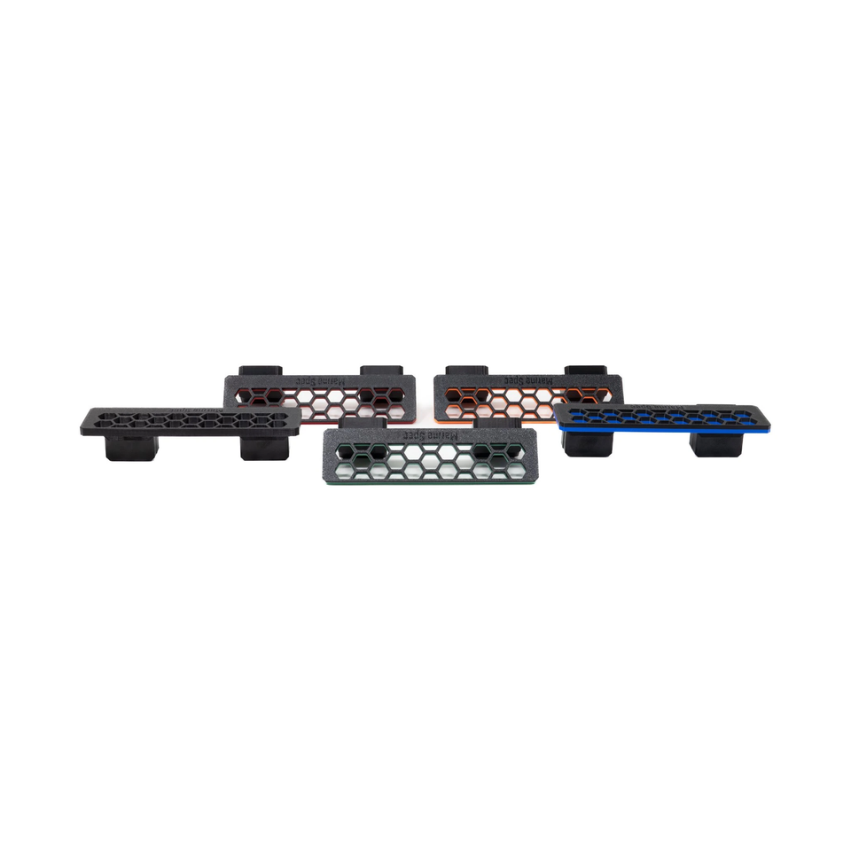 Slim magnetic frag racks in several colours seen from above