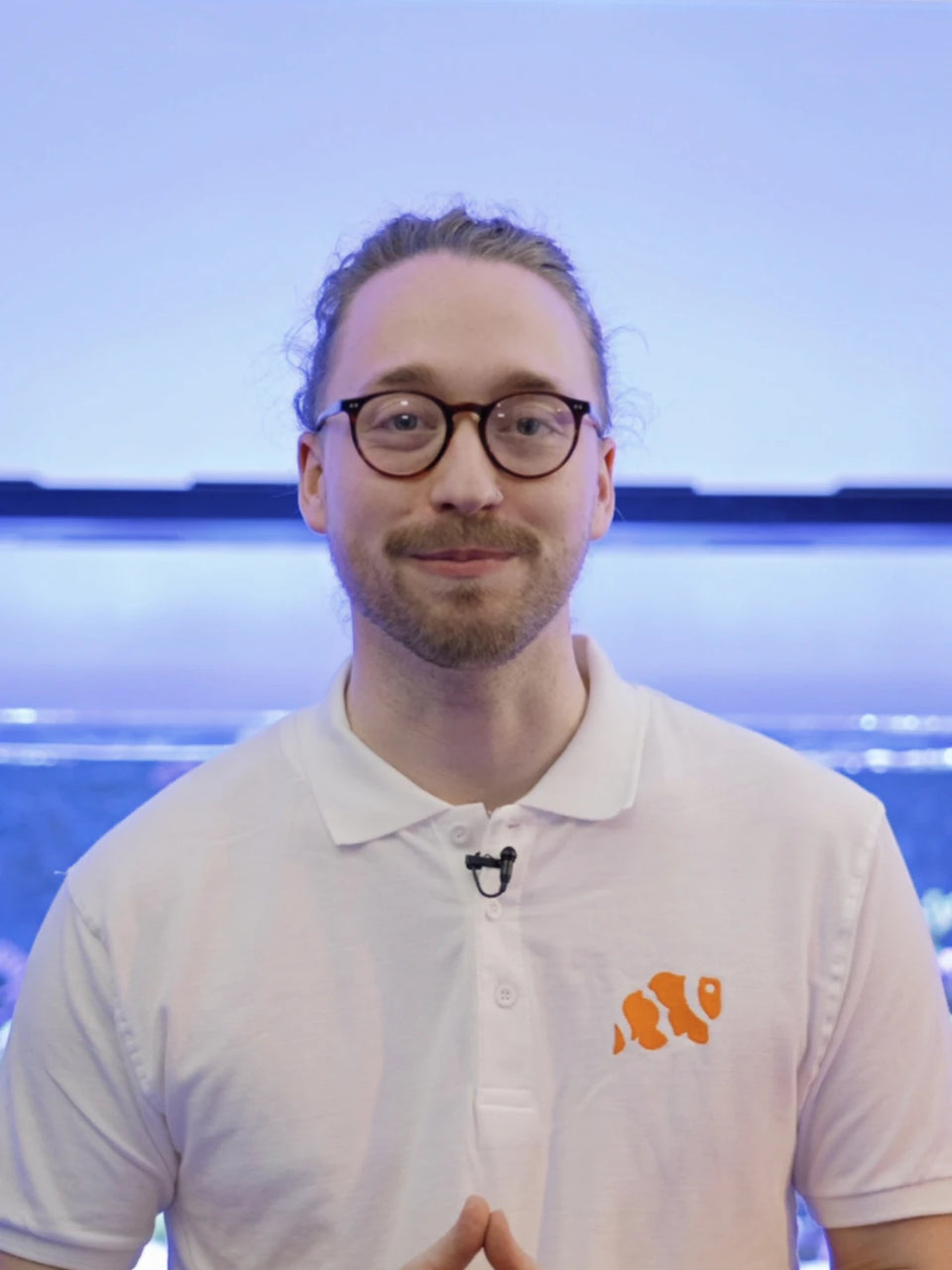 Harry from Marine Spec in a white polo shirt, presenting The Spiritual Reefer
